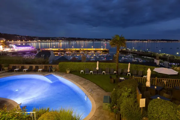 Pool & sea view at night